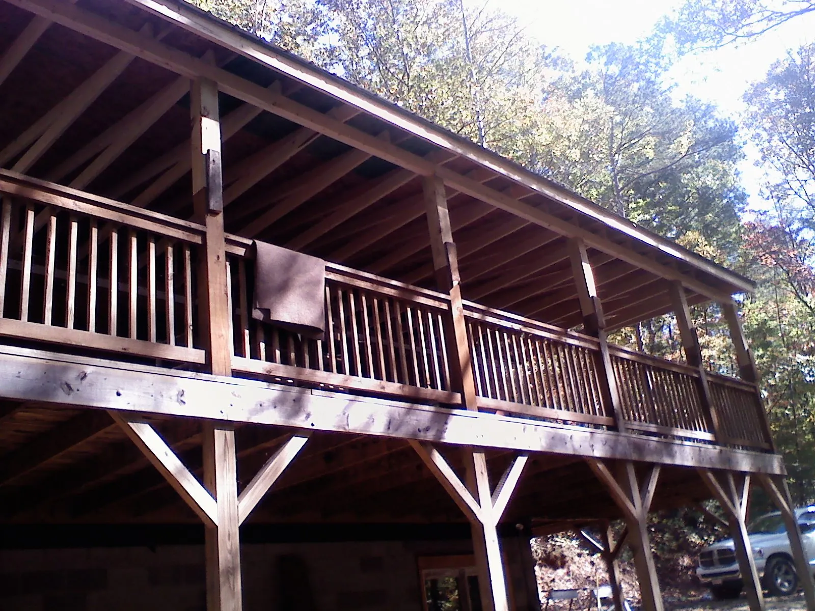 Timber framing under a new elevated porch and deck — Roof Leak Repair in Bondsville by Roofing Brothers